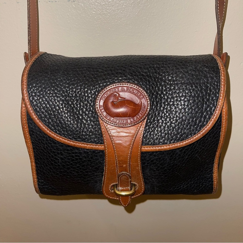 Dooney & Bourke Black with Brown Trim Pebbled Leather Crossbody Bag